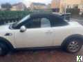 Photo 2 seater convertible white great condition with warranty