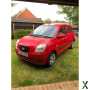 Photo Kia Picanto, ( Poppy)