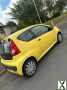 Photo Yellow Peugeot 107